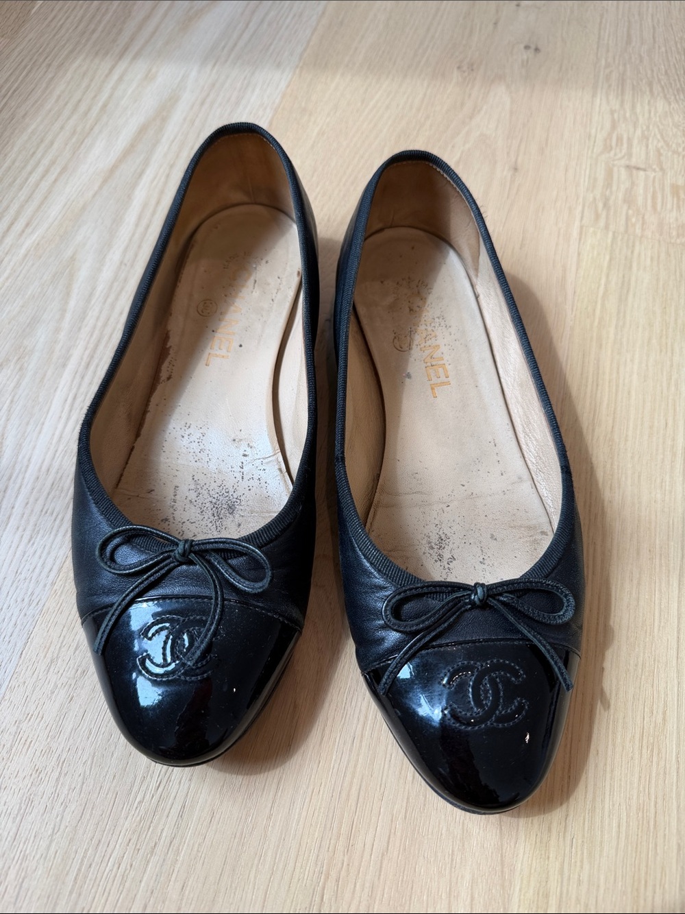 CHANEL Black Leather & Patent Cap-Toe Ballet Flats with Bow